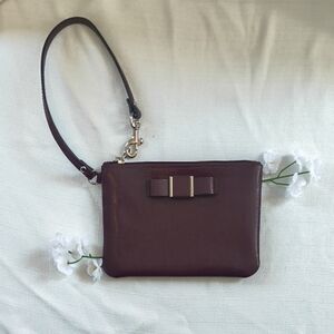 Coach Burgandy Safiano Leather Wristlet with Bow Detail